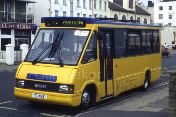 Optare MetroRider N275DWY as delivered as TIL1188 at Worthing Pier.